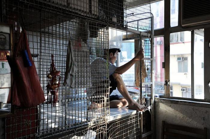 Гон-Конг - жизнь в клетке (16 фото)