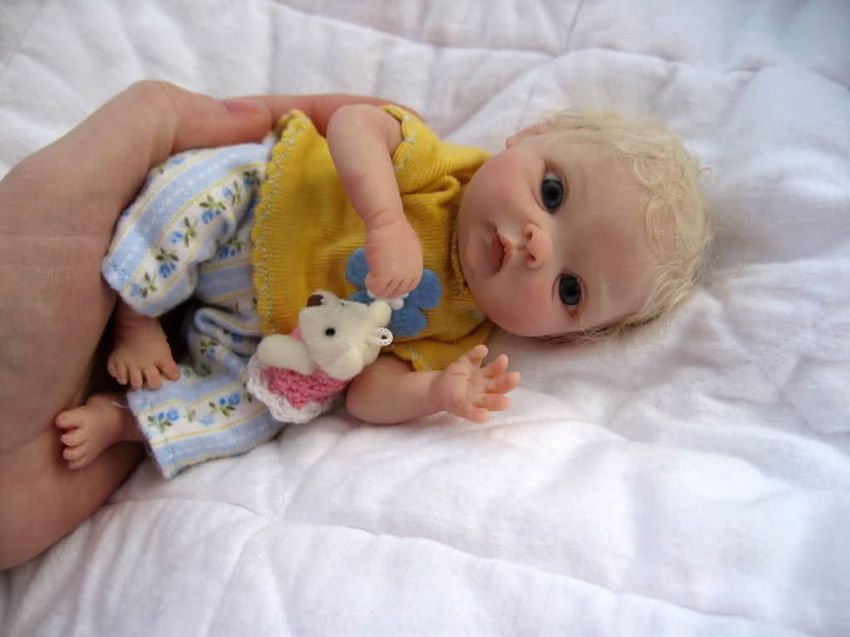 Невероятно реалистичные куклы-младенцы (23 фото)