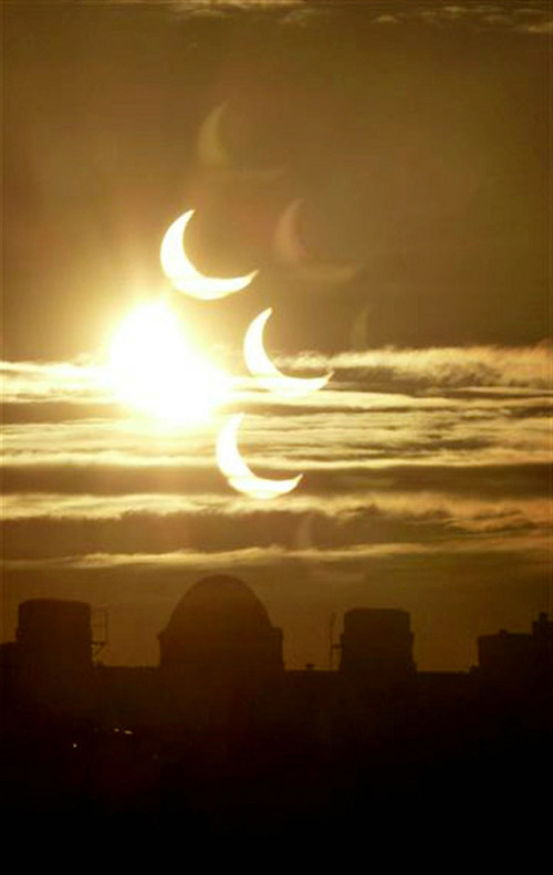 Первое солнечное затмение 2011 года (7 фото)
