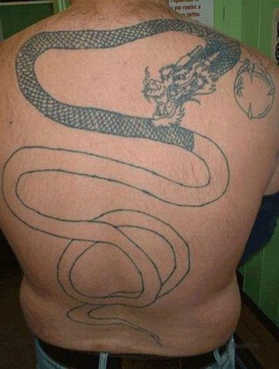 Мастер татуировки (21 фото)
