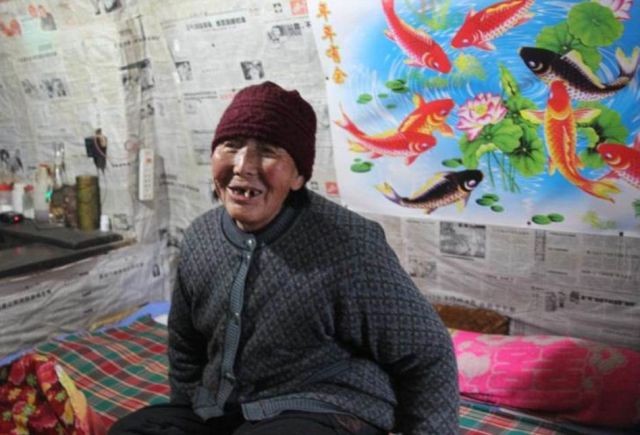 Подземные жилища китайцев (23 фото)